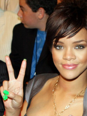 Rihanna flaunting her green nail polish. Try Green-Wich Village (a vivid