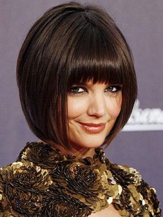 Short cut with bangs. Johnny Wright says “Bangs are